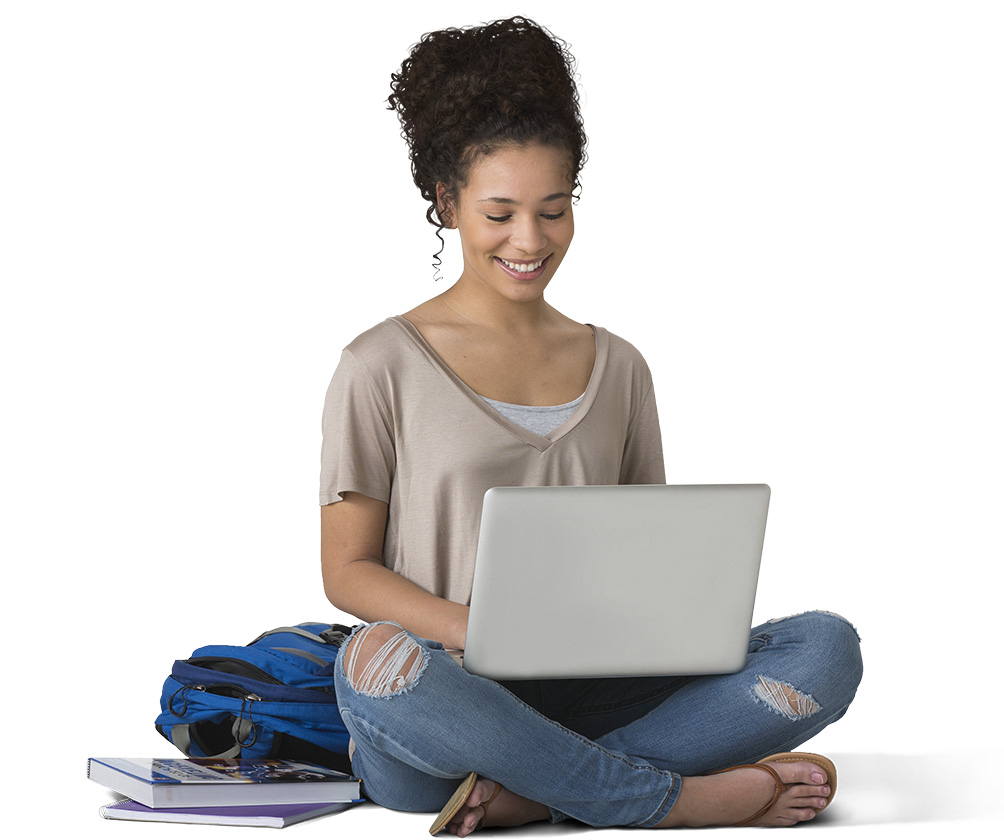 Girl sitting on the ground with her laptop